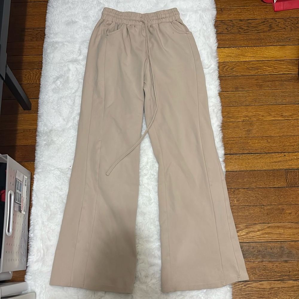 Flared beige sweatpants